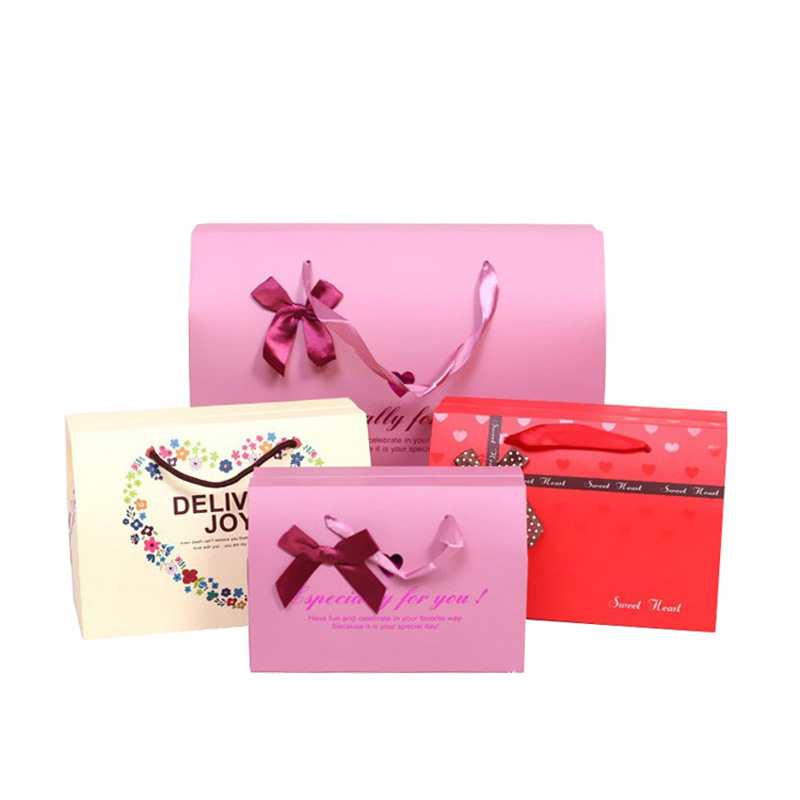 Wholesale Different Types Paper New Year Gift Suitcase Packaging Box